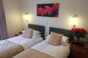 Отель The Coach House  Мелборн